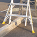 Gorilla RPL0406-LVL levelled on a kerb, Quad Leveller legs extended